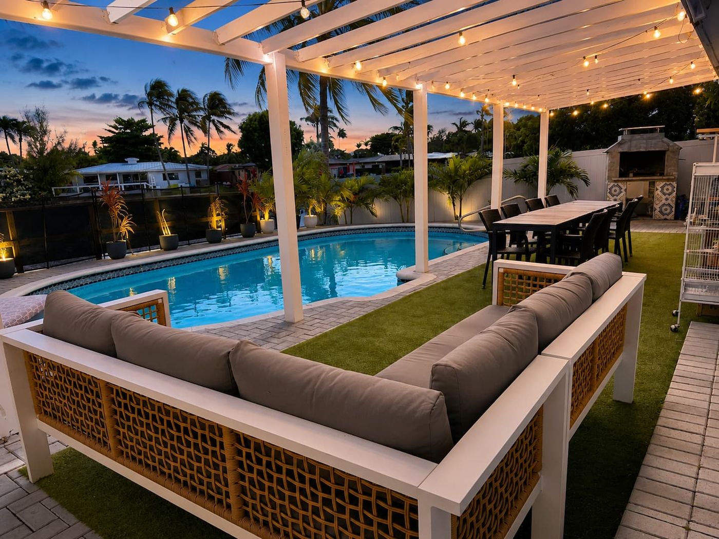 Pool deck lounge lit for an evening event